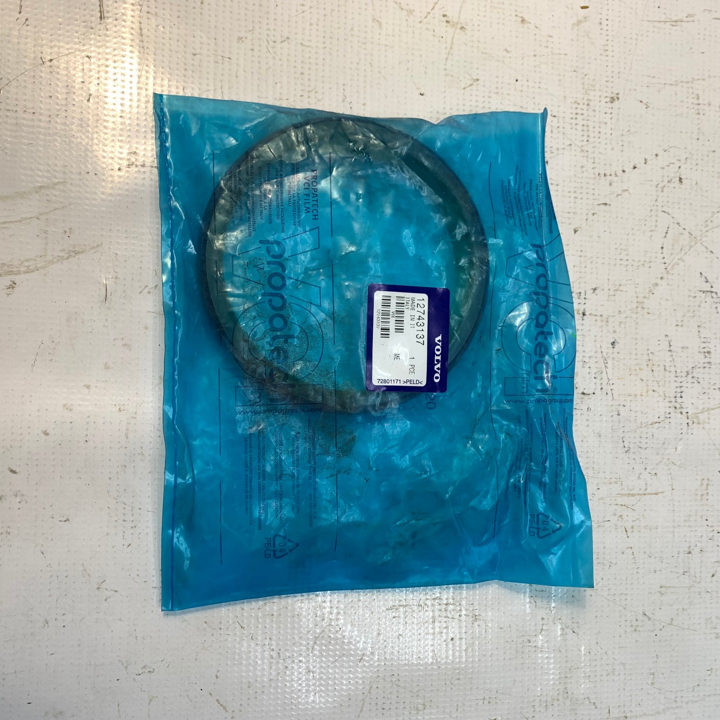 12743137